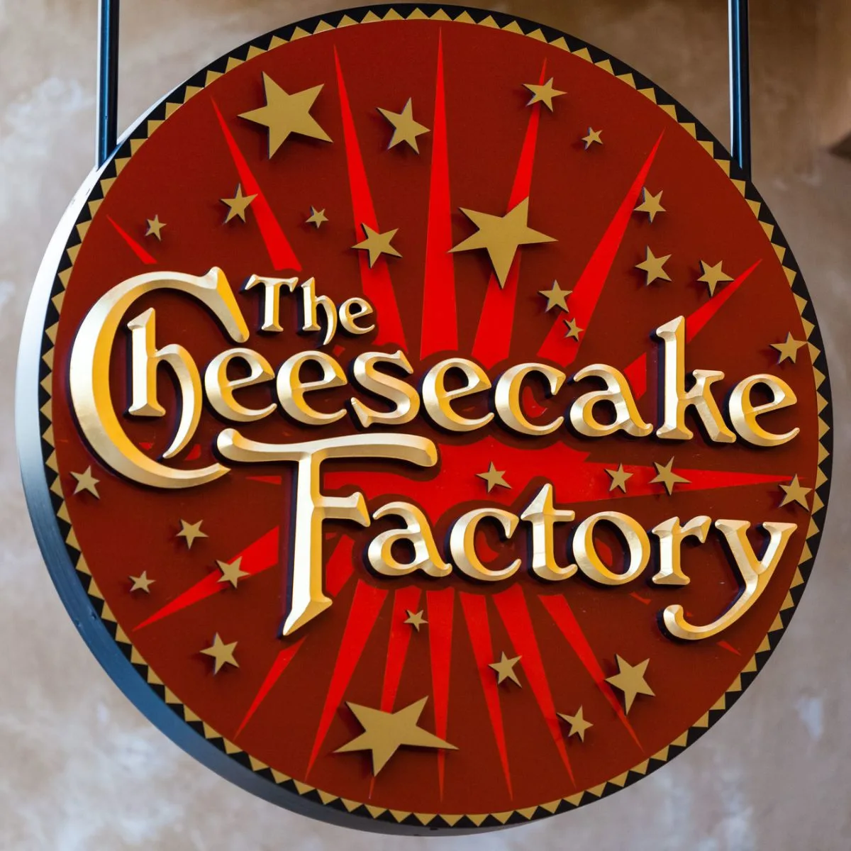 Circular Cheesecake Factory Sign.