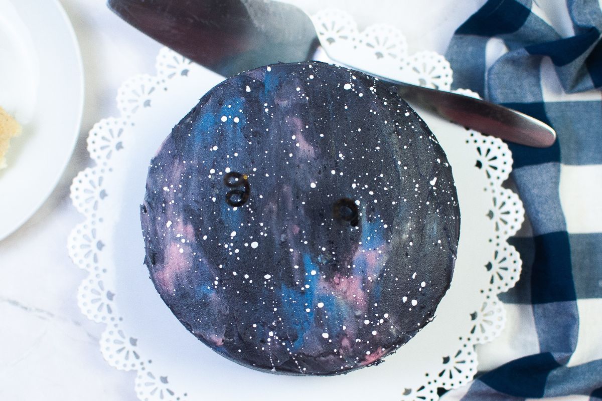 Looking down on a decorated space cake.