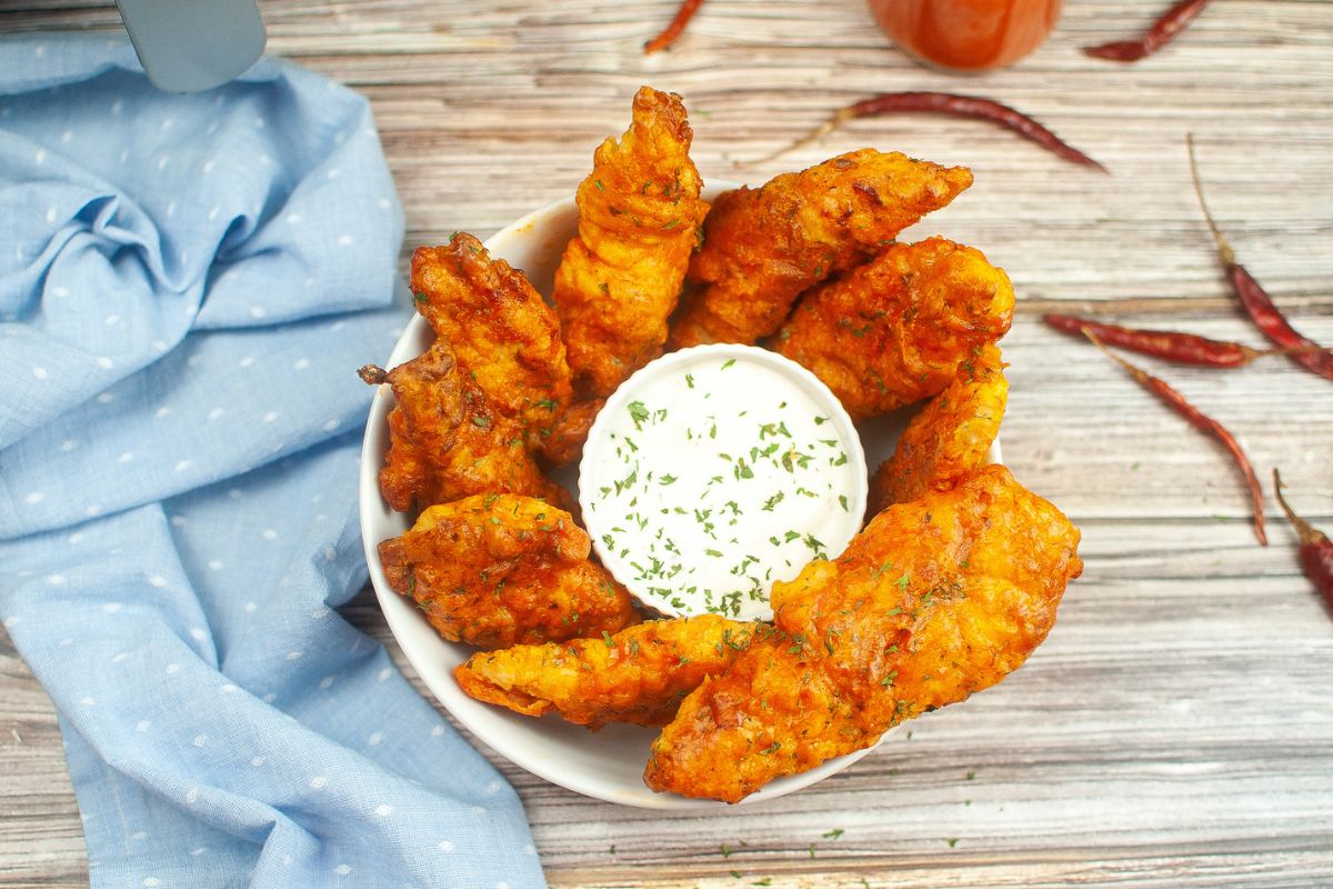 Looking down on a bowl of Air Fryer Chicken Tenders.