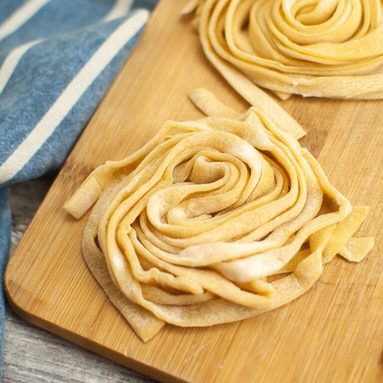 Looking closely at a nest of homemade fettuccine.