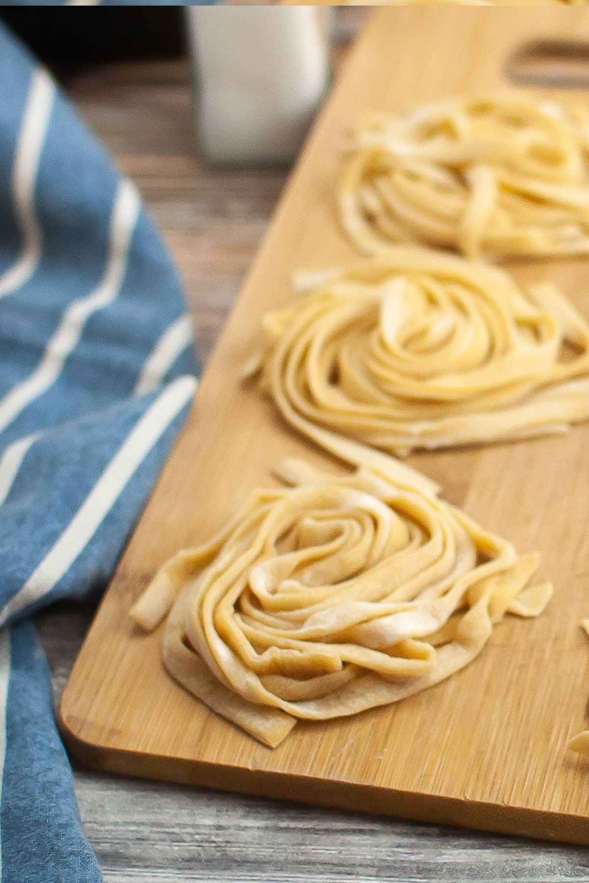 Looking down on a few nests of homemade gluten free fettuccine.