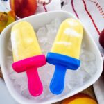 Looking down on a2 homemade Peach Popsicles.