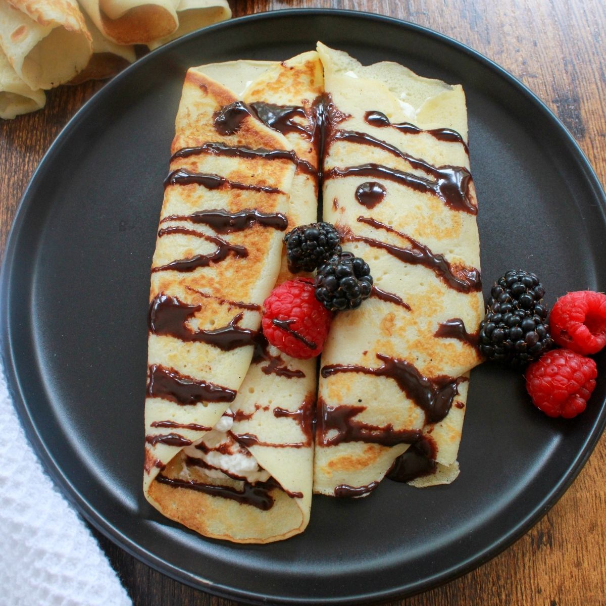 Gluten Free Crepes with chocolate and berries.